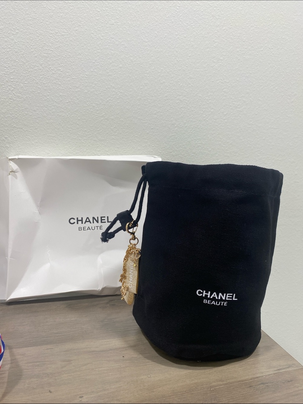 CHANEL Black Drawstring Cosmetic Pouch with Gold Charm